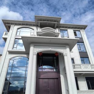 白麻别墅外墙干挂石材效果示例