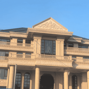 黄金麻别墅外墙干挂石材效果示例