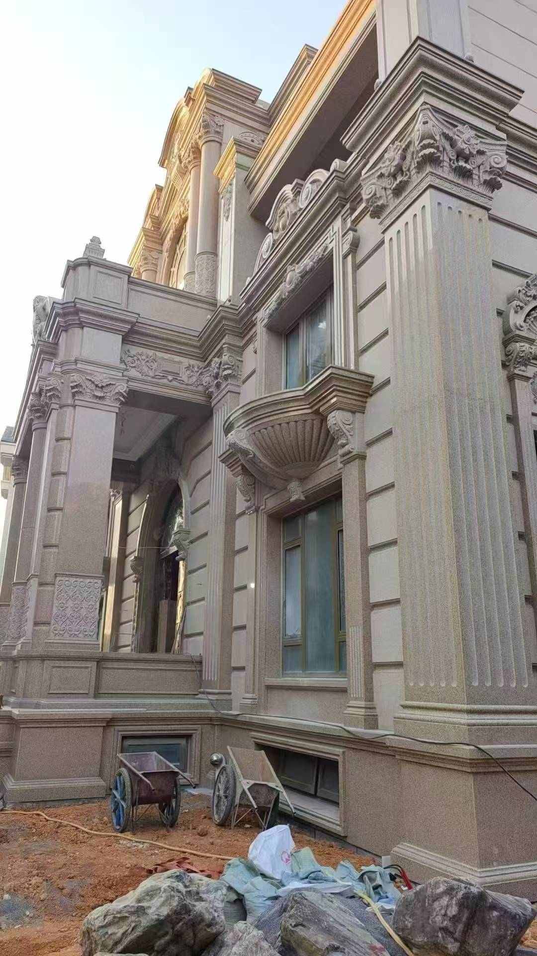  黄金麻花岗岩光面别墅外墙干挂施工完成